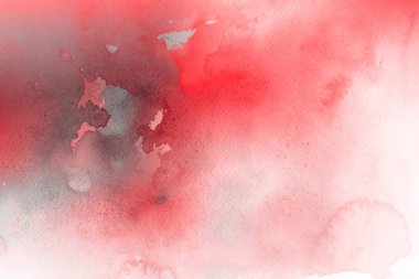 Kağıt arka plan üzerinde kırmızı sulu boya boya