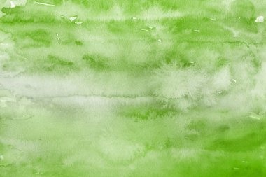 Kağıt arka plan üzerinde yeşil suluboya boya