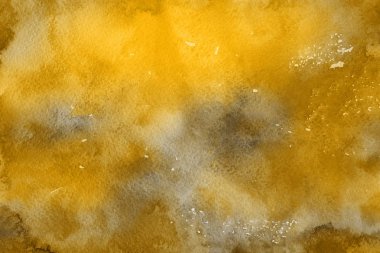 Kağıt arka plan üzerinde altın suluboya boya