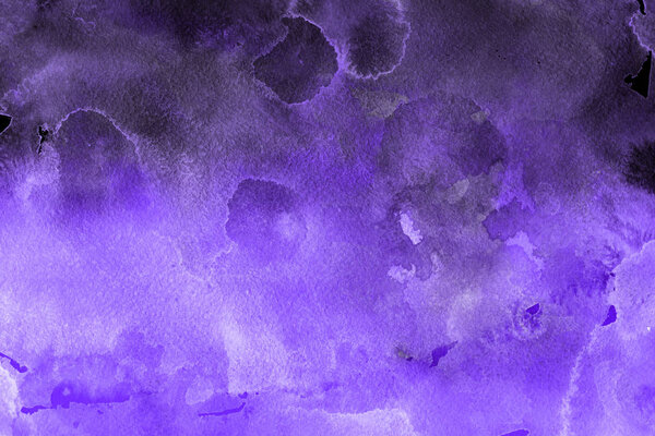 Purple watercolor paint on paper abstract background