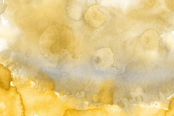 Kağıt arka plan üzerinde altın suluboya boya