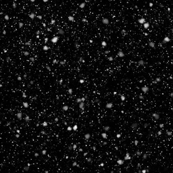 abstract wallpaper with falling snow on black background