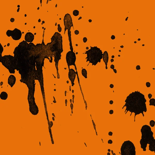 Orangebackground Doku Soyut Siyah Boya Splatters — Stok fotoğraf