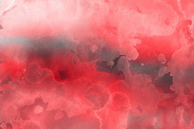 Kağıt arka plan üzerinde kırmızı sulu boya boya