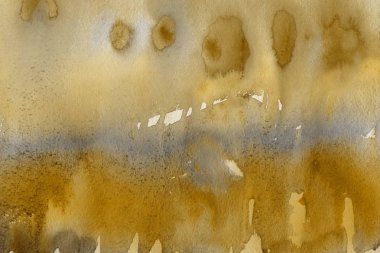 Kağıt arka plan üzerinde altın suluboya boya