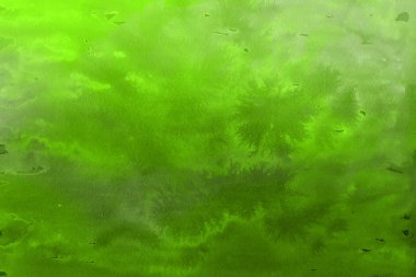 Kağıt arka plan üzerinde yeşil suluboya boya