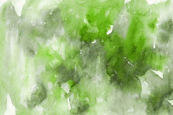green watercolor paint on paper abstract background