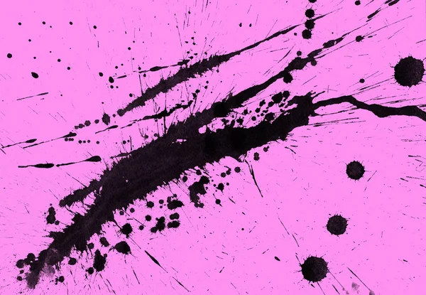 Soyut siyah boya doku pembe bir arka plan üzerinde splatters