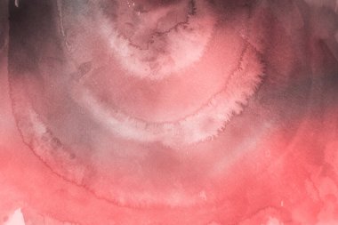 Kağıt arka plan üzerinde kırmızı sulu boya boya