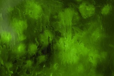 Kağıt arka plan üzerinde yeşil suluboya boya