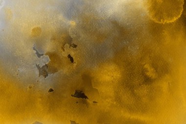 Kağıt arka plan üzerinde altın suluboya boya