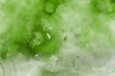 Kağıt arka plan üzerinde yeşil suluboya boya