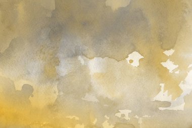 Kağıt arka plan üzerinde altın suluboya boya