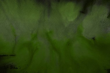 Kağıt arka plan üzerinde yeşil suluboya boya