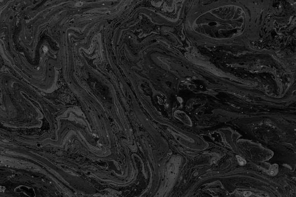 black Marble background with paint splashes texture