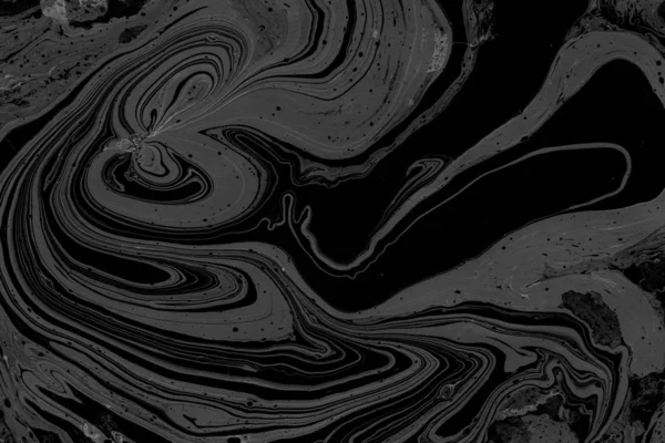 black Marble background with paint splashes texture