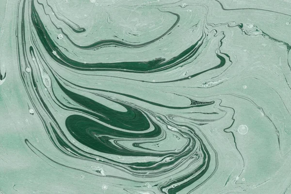 green Marble background with paint splashes texture