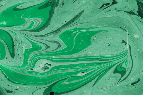 green Marble background with paint splashes texture
