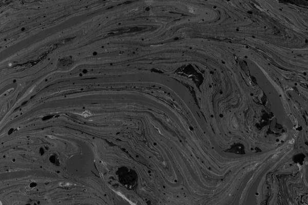 black Marble background with paint splashes texture