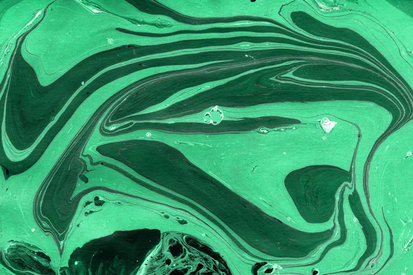 green Marble background with paint splashes texture