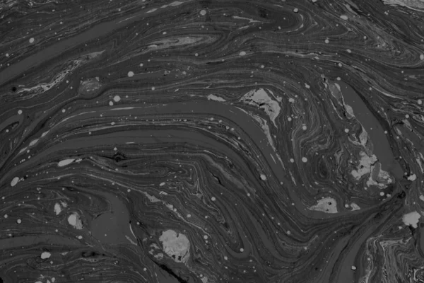 black Marble background with paint splashes texture