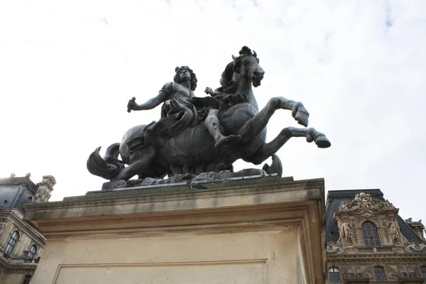 King Louis on horse sculpture in Paris