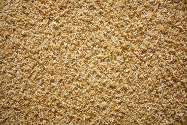 Sarı halı dokulu arka plan.