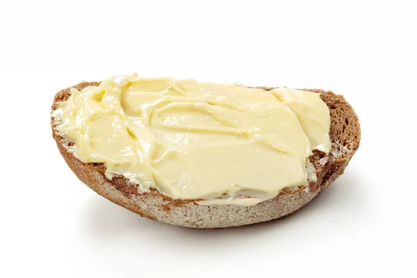 用孤立的白色背景上的面包黄油 — 图库照片