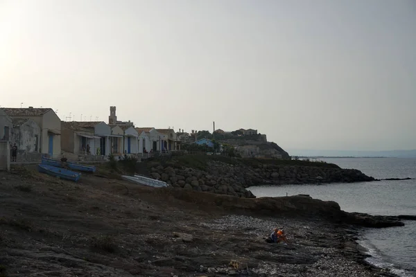 Porto Palo Sicily migrants landing zone beach boat