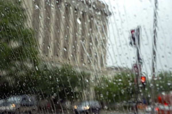 heavy rain on car glass window  in washington dc usa
