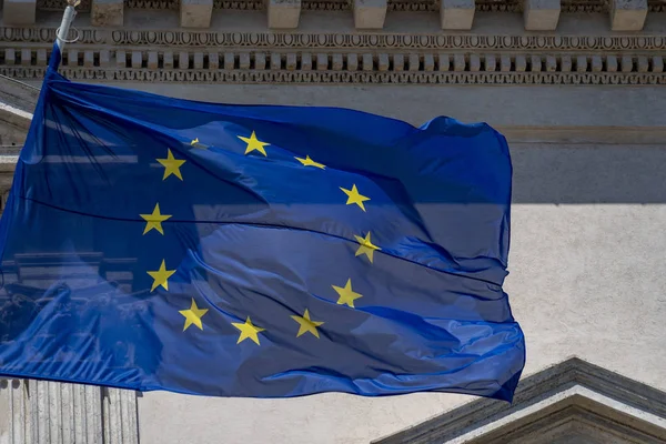 Europe waving blue gold star flag in rome