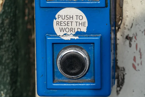 Pousser pour réinitialiser le bouton monde — Photo