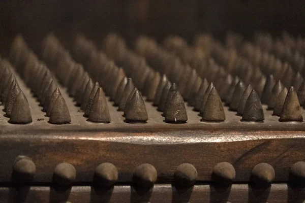 Torture iron spikes medieval chair — Stock Photo, Image