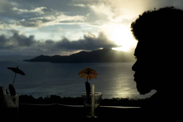 Black man silohuette at sunset on the beach — Stock Photo, Image