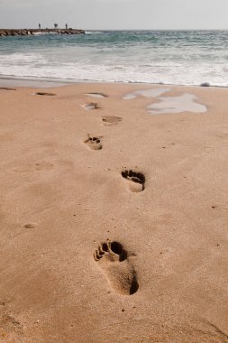 Kumda, sahilde, Cova do Vapor, Portekiz