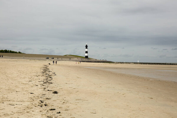 Черно-белый полосатый маяк, Брескенс, Нидерланды
