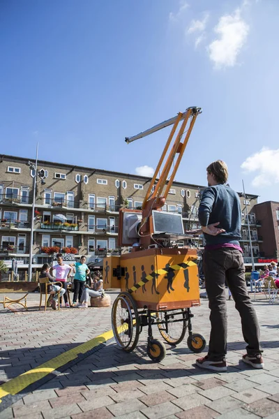 Amsterdam, The Netherlands, 13 September 2014, at West'ival, a free open air Cinema and culture festival on Mercatorplein. slow motion workshop for children