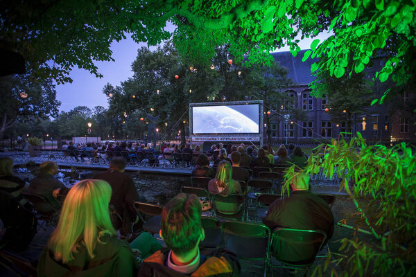 Amsterdam, The Netherlands - August 11 2018: open air screening of Cuban film Sergio and Serguei at De Troppen garden during World Cinema Amsterdam, a world film festival held from 11 to 25/08/2018