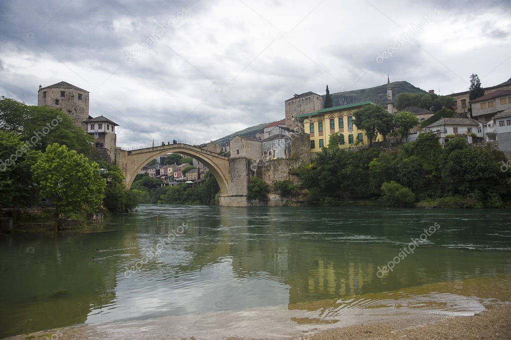 View of the single-arch Old Bridge or Stari Most crossing the Neretva River in Mostar, Bosnia and Herzegovina. 
