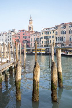 VENICE, ITALY  December 25, 2015: gondolas on the Grand Canal, Gondola trip is the most popular touristic activity