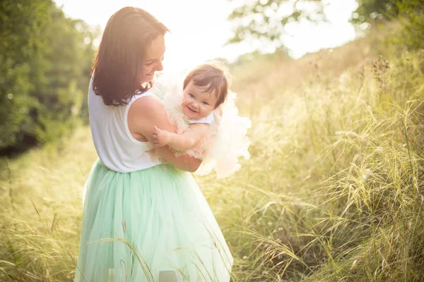 Mom Holds Baby Daughter Her Arms Have Fun Child Smiles — Stock Photo, Image