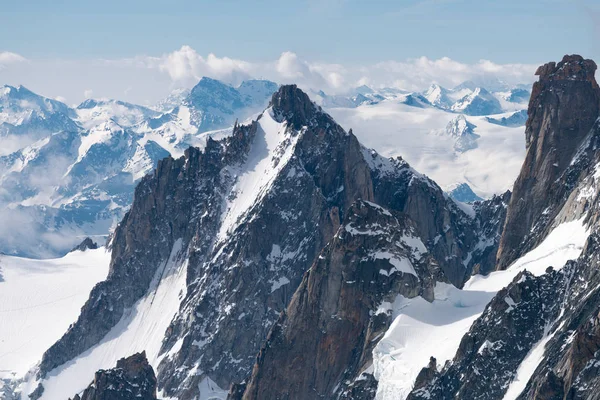 Mont Blanc is the highest mountain in the Alps and the highest in Europe. Beautiful panorama of European Alps in sunny day. Haute-Savoie, France