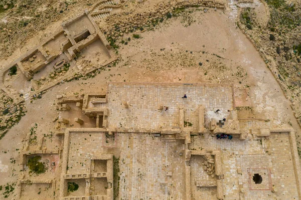 Aerial panoramic spring view of the ruined Ancient Nabataean city of Avdat, now a national Park, in the Israel\'s Negev Desert, Southern Israel.