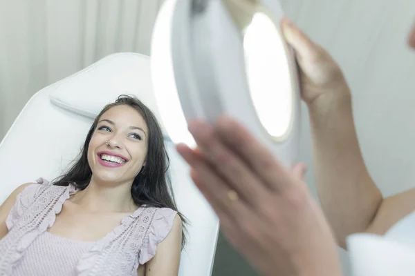 Young woman in beauty center ready for treatment