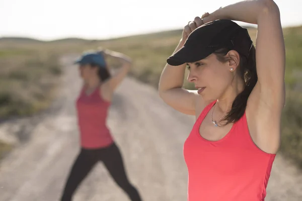 Friends woman preparing for outdoors run training in spring day