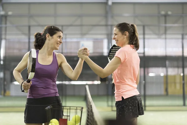 Woman fair play handshake before match