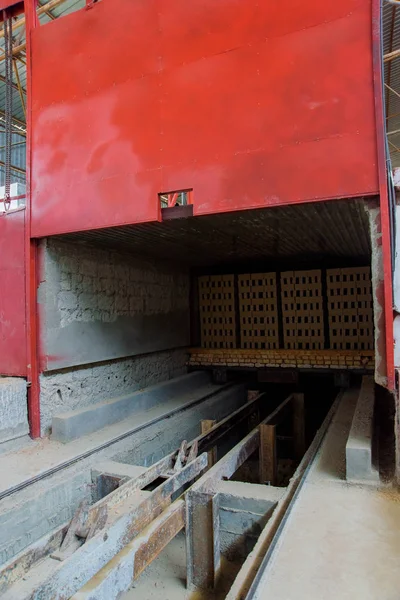 Industrial oven for drying bricks. Production of brick blocks in the factory. Preparing bricks for sale. High temperature oven. Brick oven