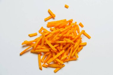 Gevrek patates kırmızı biber ile sopa. Cum. Patates kızartması doku. Patates cipsi. Baharatlı patates kızartması. Fast food. Yukarıdan görüntüleyin. Ücretsiz yakın çekim.