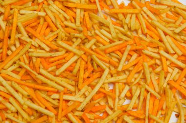 Gevrek patates yapışır. Cum. Patates kızartması doku. Patates cipsi. Tuzlu ve peynir kızartması. Fast food. Yukarıdan görüntüleyin. Ücretsiz yakın çekim.