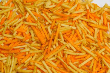 Gevrek patates yapışır. Cum. Patates kızartması doku. Patates cipsi. Tuzlu ve peynir kızartması. Fast food. Yukarıdan görüntüleyin. Ücretsiz yakın çekim.